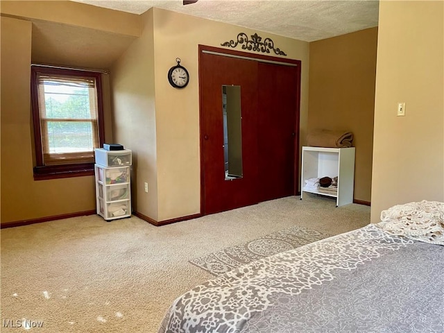 67966 Old Twenty One Rd, Cambridge, OH 43725 - carpeted bedroom with a closet and a textured ceiling