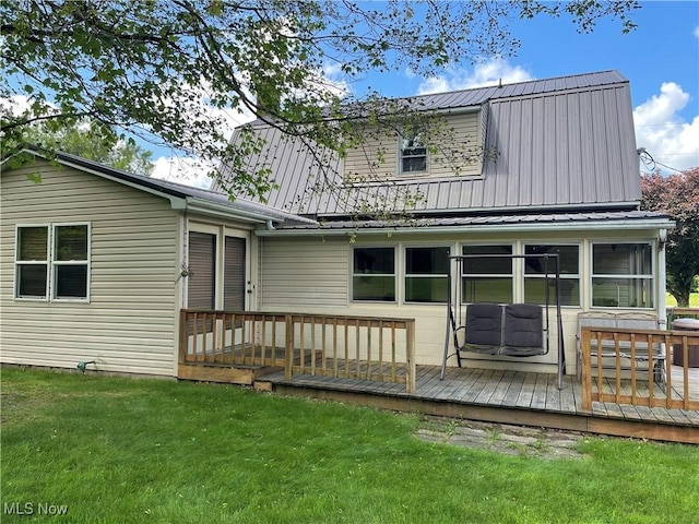 67966 Old Twenty One Rd, Cambridge, OH 43725 - rear view of house with a wooden deck, a lawn, and a metal roof