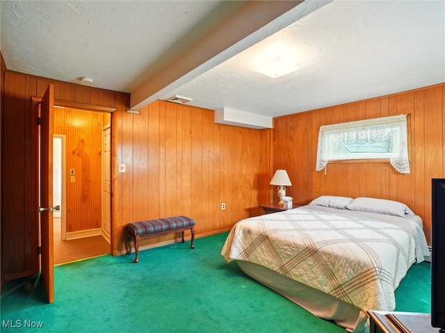 290-289 Park Ave, Conneaut, OH 44030 - bedroom with carpet, wood walls, and a textured ceiling