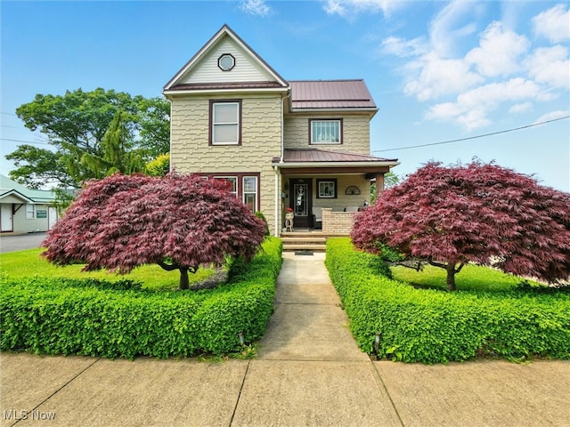 290-289 Park Ave, Conneaut, OH 44030 - traditional-style house with covered porch, a standing seam roof, and a metal roof