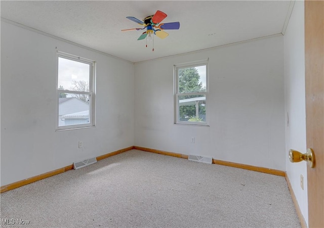 719 Pomeroy Pike, Belpre, OH 45714 - spare room with carpet flooring and ceiling fan