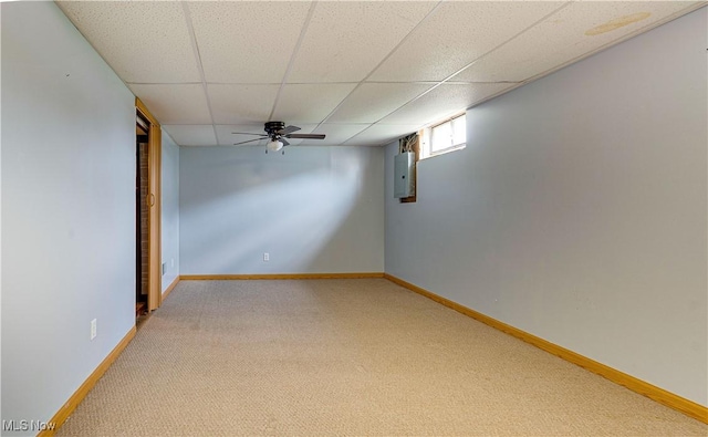 719 Pomeroy Pike, Belpre, OH 45714 - spare room with light colored carpet, a drop ceiling, and electric panel