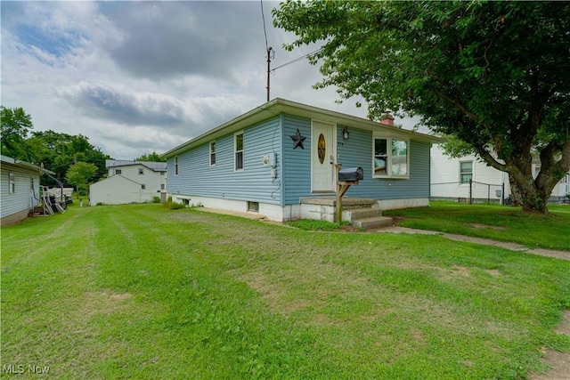 719 Pomeroy Pike, Belpre, OH 45714 - view of front facade featuring a chimney