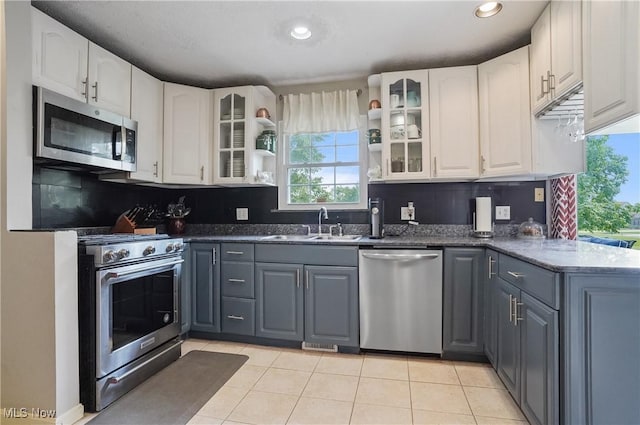 220 Long Rd, Macedonia, OH 44056 - kitchen featuring stainless steel appliances, gray cabinetry, white cabinetry, light tile patterned flooring, and recessed lighting