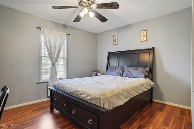 220 Long Rd, Macedonia, OH 44056 - bedroom with dark wood-style flooring and a ceiling fan