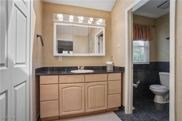 220 Long Rd, Macedonia, OH 44056 - bathroom featuring vanity and tile walls