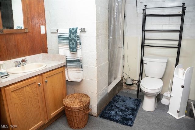 7355 Westview Dr, Boardman, OH 44512 - full bathroom featuring vanity, curtained shower, and concrete block wall