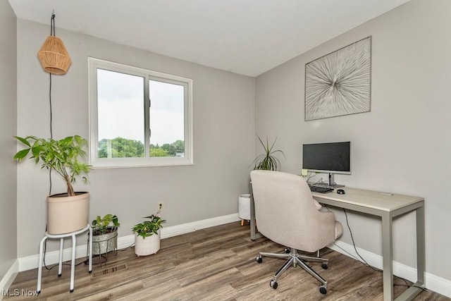 1657 Kasserine Ct, Twinsburg, OH 44087 - office area featuring wood finished floors and baseboards