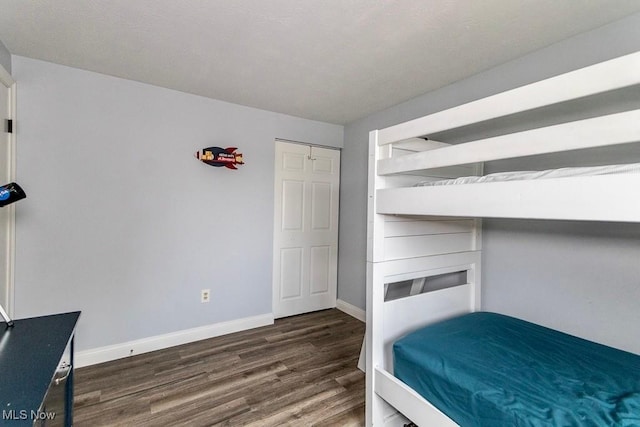 1657 Kasserine Ct, Twinsburg, OH 44087 - unfurnished bedroom featuring wood finished floors and baseboards