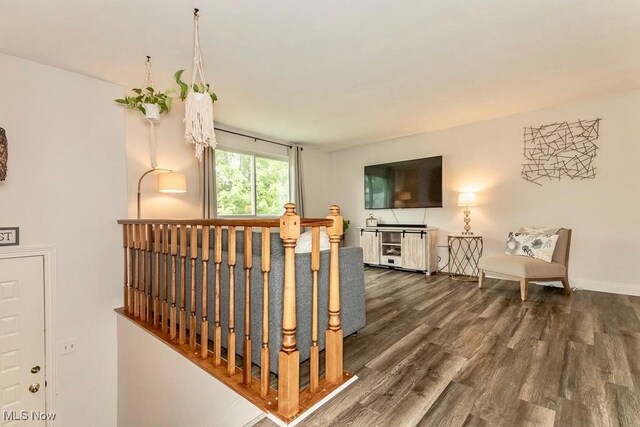 1657 Kasserine Ct, Twinsburg, OH 44087 - hallway featuring wood finished floors and baseboards