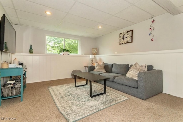 1657 Kasserine Ct, Twinsburg, OH 44087 - carpeted living area with a paneled ceiling, a wainscoted wall, and recessed lighting