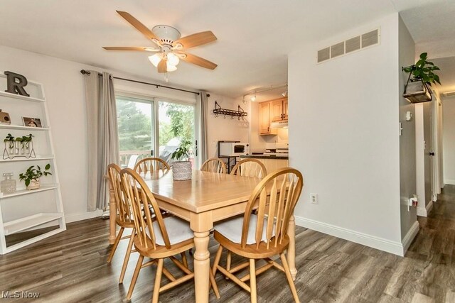 1657 Kasserine Ct, Twinsburg, OH 44087 - dining space with wood finished floors and ceiling fan