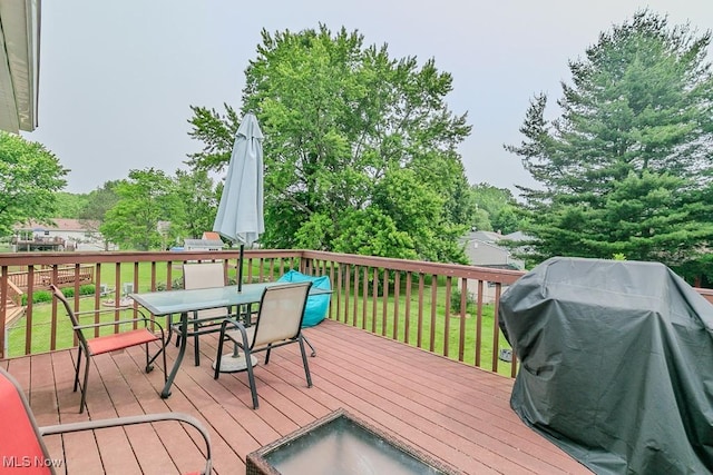 1657 Kasserine Ct, Twinsburg, OH 44087 - wooden terrace featuring outdoor dining area, grilling area, and a lawn