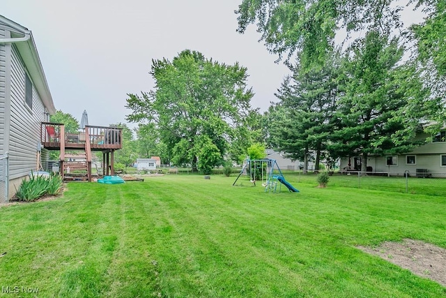 1657 Kasserine Ct, Twinsburg, OH 44087 - view of yard with a deck, a playground, and stairs