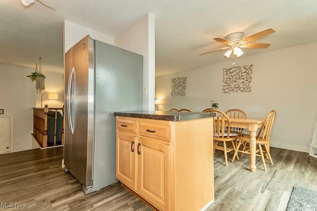 1657 Kasserine Ct, Twinsburg, OH 44087 - kitchen featuring freestanding refrigerator, light wood-type flooring, ceiling fan, light brown cabinets, and dark countertops