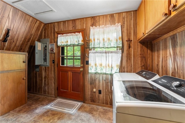 52 Arbor Rd NE, Minerva, OH 44657 - laundry room with cabinet space, wooden walls, electric panel, and washing machine and dryer