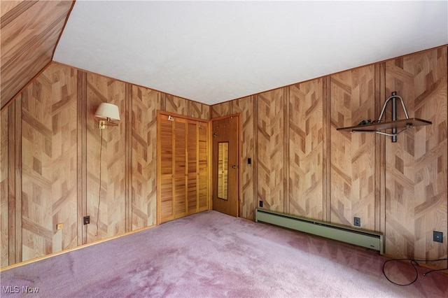 52 Arbor Rd NE, Minerva, OH 44657 - carpeted spare room with a baseboard heating unit and wooden walls
