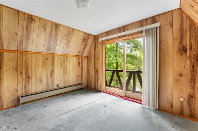 52 Arbor Rd NE, Minerva, OH 44657 - carpeted empty room featuring a baseboard heating unit and wood walls