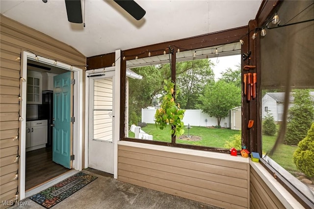 858 11th St NE, Massillon, OH 44646 - unfurnished sunroom with ceiling fan