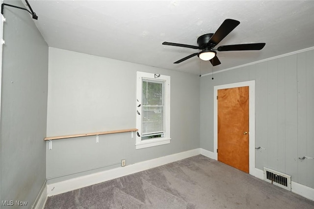 858 11th St NE, Massillon, OH 44646 - empty room with carpet and a ceiling fan