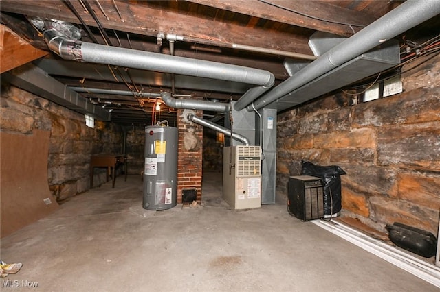 858 11th St NE, Massillon, OH 44646 - unfinished below grade area with water heater and heating unit