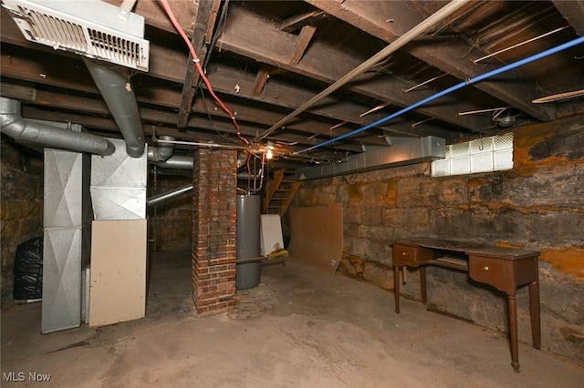 858 11th St NE, Massillon, OH 44646 - unfinished basement featuring gas water heater, stairs, and heating unit