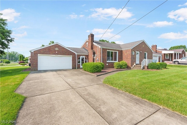 230 Hamilton Blvd, Struthers, OH 44471 - view of front of property with brick siding, an attached garage, a front yard, and driveway