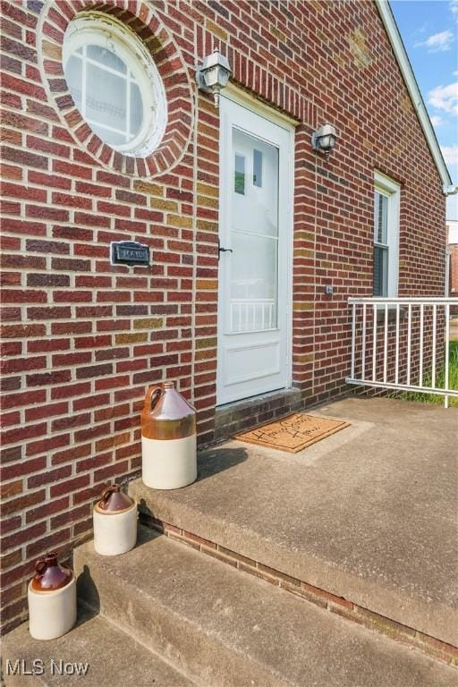 230 Hamilton Blvd, Struthers, OH 44471 - property entrance with brick siding