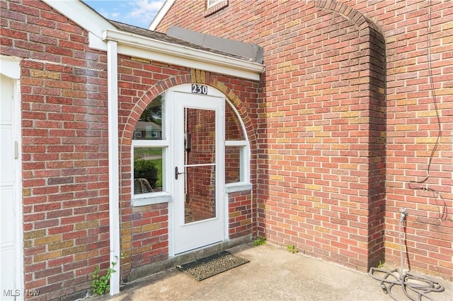 230 Hamilton Blvd, Struthers, OH 44471 - property entrance featuring brick siding