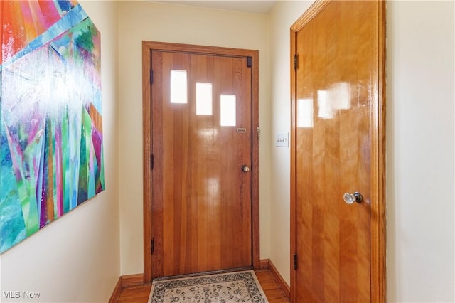 230 Hamilton Blvd, Struthers, OH 44471 - doorway featuring baseboards and wood finished floors