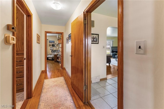 230 Hamilton Blvd, Struthers, OH 44471 - hall with arched walkways and light wood-style floors