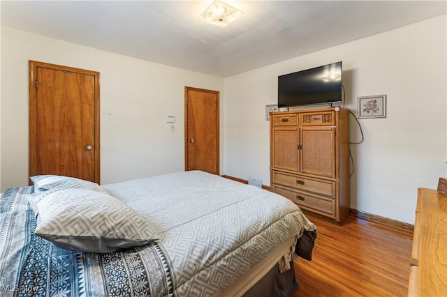 230 Hamilton Blvd, Struthers, OH 44471 - bedroom with wood finished floors and baseboards