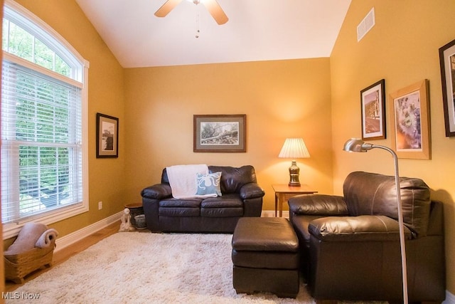 8311 Hemingway Ln, Mentor, OH 44060 - living area featuring lofted ceiling, a ceiling fan, and wood finished floors