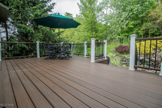 8311 Hemingway Ln, Mentor, OH 44060 - wooden terrace featuring outdoor dining area