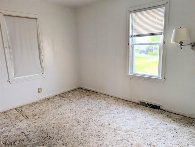 173 6th St SW, Brewster, OH 44613 - carpeted spare room featuring baseboards