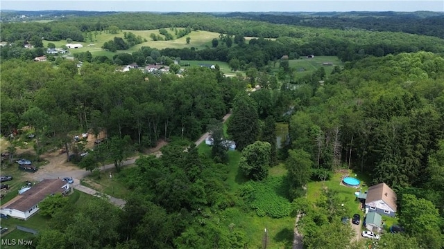 51 Buckeye Dr, New Cumberland, WV 26047 - aerial view of property and surrounding area featuring a heavily wooded area