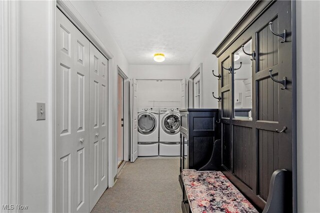 52 Hilda Cir, Bloomingdale, OH 43910 - laundry room featuring washer and clothes dryer and light colored carpet