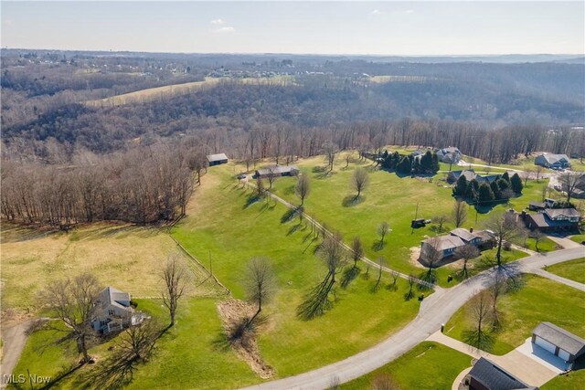 52 Hilda Cir, Bloomingdale, OH 43910 - aerial overview of property's location featuring a heavily wooded area