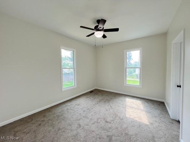 619 N 3rd St, Dennison, OH 44621 - spare room with carpet and ceiling fan