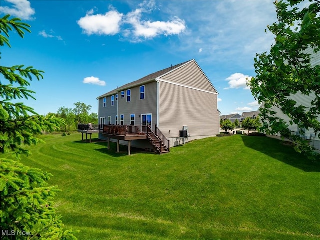 3243 Broadleaf Way, Brunswick, OH 44212 - back of house featuring a wooden deck, a lawn, and stairway