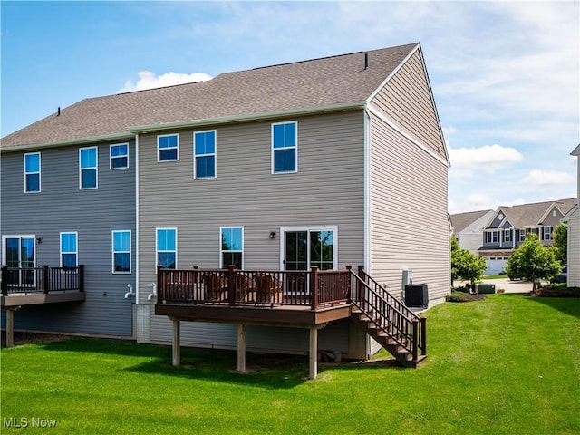 3243 Broadleaf Way, Brunswick, OH 44212 - back of property featuring a wooden deck, a lawn, and stairs