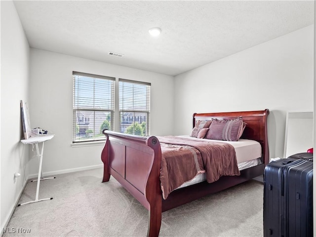 3243 Broadleaf Way, Brunswick, OH 44212 - carpeted bedroom with baseboards and a textured ceiling