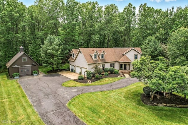 1681 State Rd, Warren, OH 44481 - view of front facade featuring a front lawn and an outbuilding