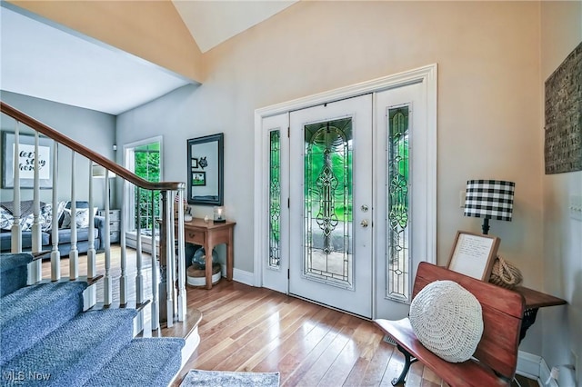 1681 State Rd, Warren, OH 44481 - foyer featuring stairs, hardwood / wood-style flooring, and vaulted ceiling