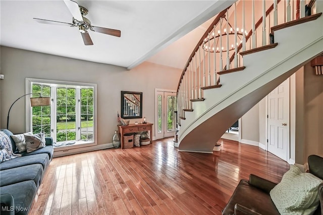 1681 State Rd, Warren, OH 44481 - living room with stairway, hardwood / wood-style floors, and a ceiling fan