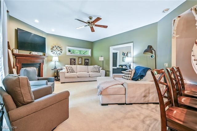 1681 State Rd, Warren, OH 44481 - carpeted living area featuring ceiling fan, a fireplace, and recessed lighting