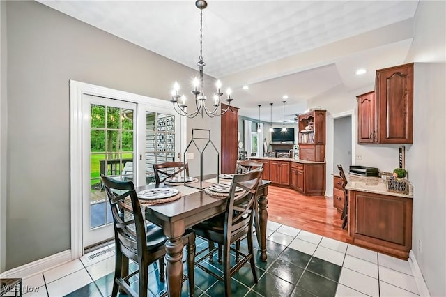 1681 State Rd, Warren, OH 44481 - dining space featuring plenty of natural light, a chandelier, light tile patterned flooring, and recessed lighting