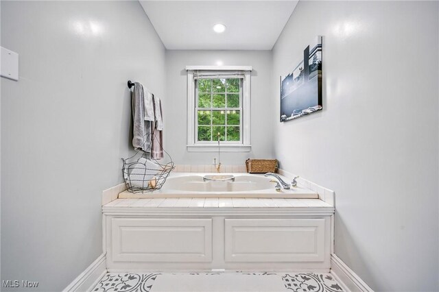 1681 State Rd, Warren, OH 44481 - full bath with a garden tub and baseboards