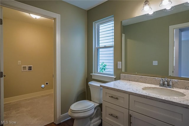 583 Creedmore Ave, Barberton, OH 44203 - bathroom featuring vanity and toilet
