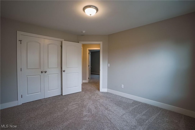 583 Creedmore Ave, Barberton, OH 44203 - unfurnished bedroom with carpet flooring and a closet